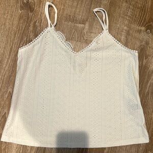 White eyelet sleeveless blouse
